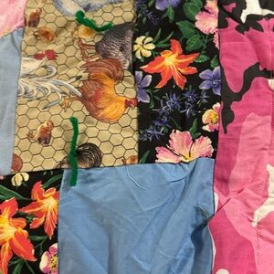 Homemade throw, multi color, size is almost the same as a large couch.